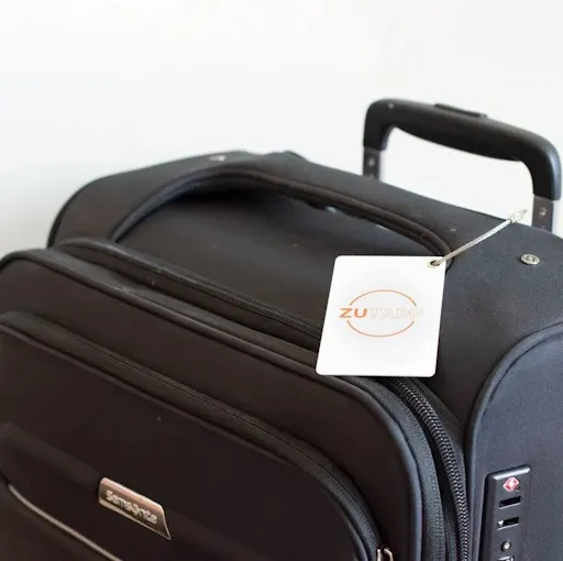 Suitcase with a ZuTapp luggage tag